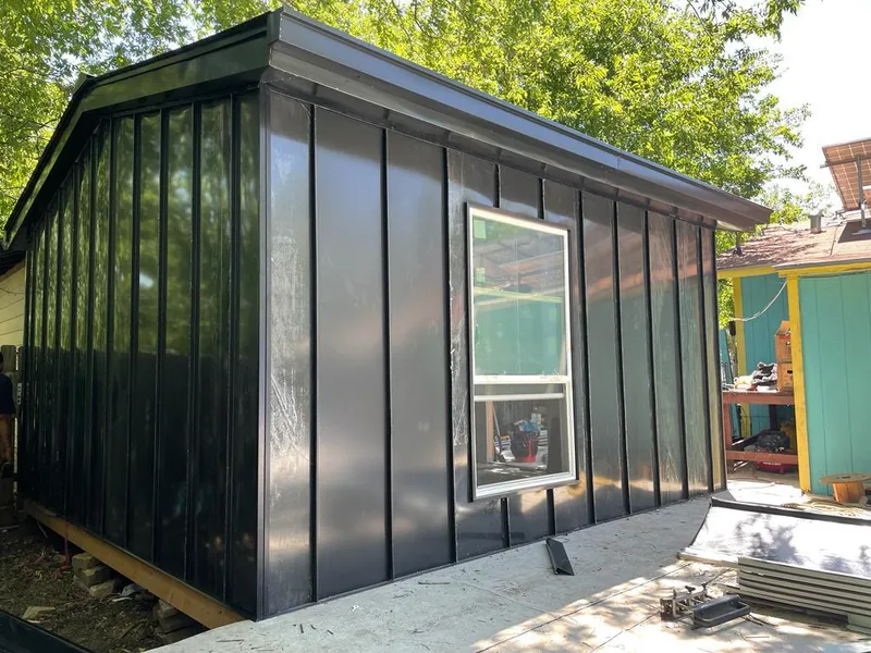 Black standing seam metal wall panels for Roof Inspection in Pine Ridge